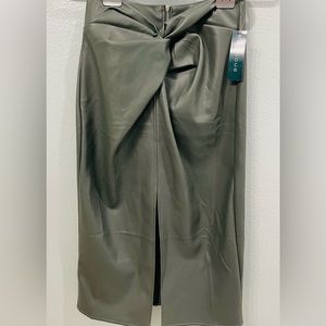 Kirious olive green knot front , faux leather skirt. women’s size M
